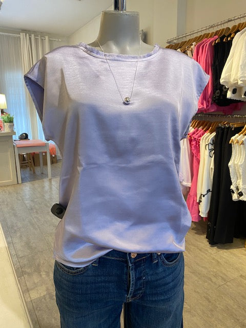 Melissa Nepton satin crew neck top by Melissa Nepton on display inside Lemonberry in Aurora Ontario.