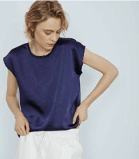 A blue version of the crew Willow Top by Melissa Nepton, paired with white trousers, is great for a relaxing day out with friends. Available at Lemonberry in Aurora Ontario.
