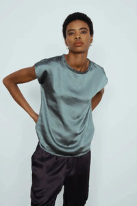 A satin top by Melissa Nepton, paired with equally satin pants for a chic but relaxed look available across the Canada with free shipping options at Lemonberry.ca.