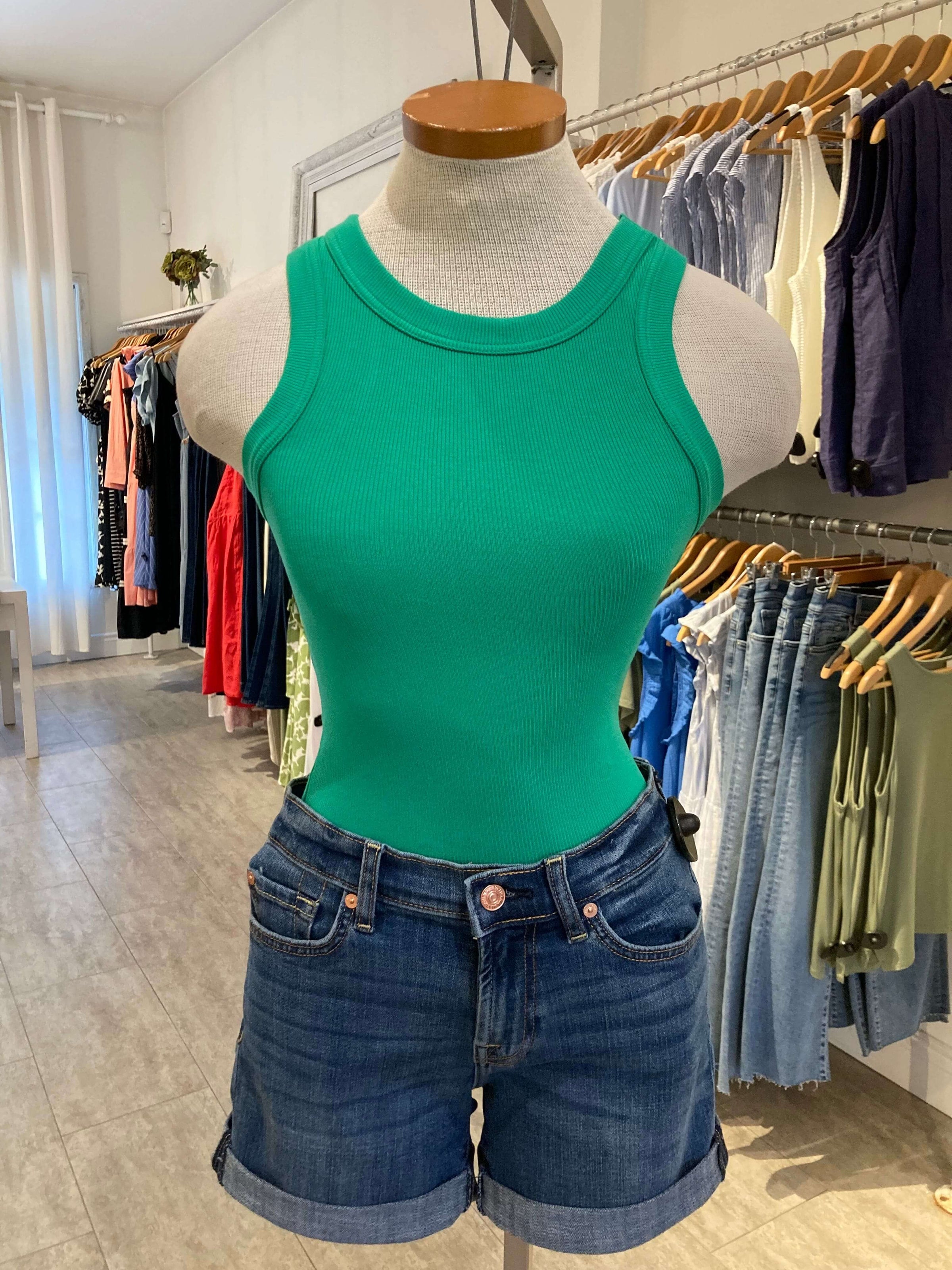 Green Danika tank on mannequin paired with denim shorts in Lemonberry boutique