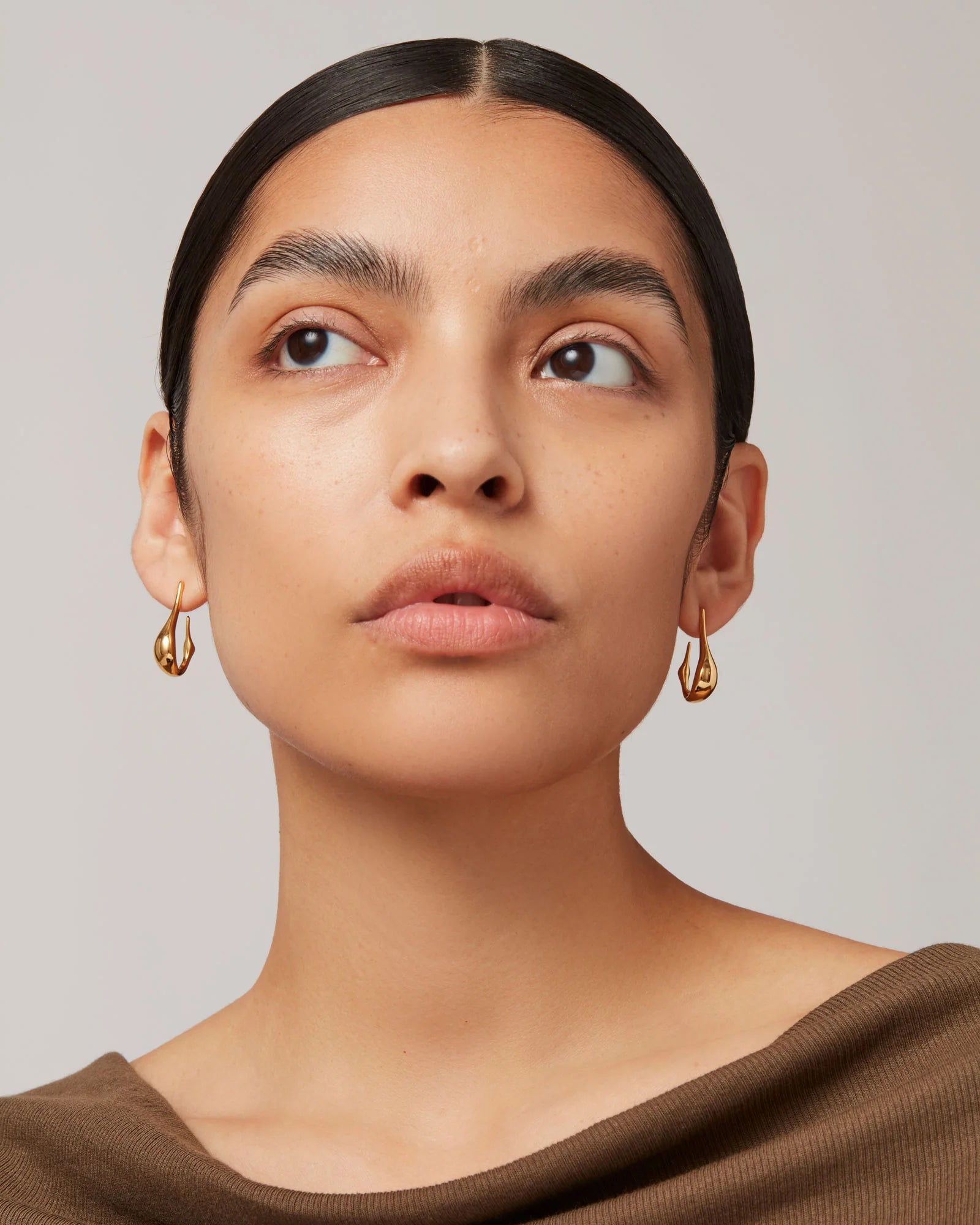 Jenny Bird Colette Hoop Small in gold — front view on model, Lemonberry Aurora.