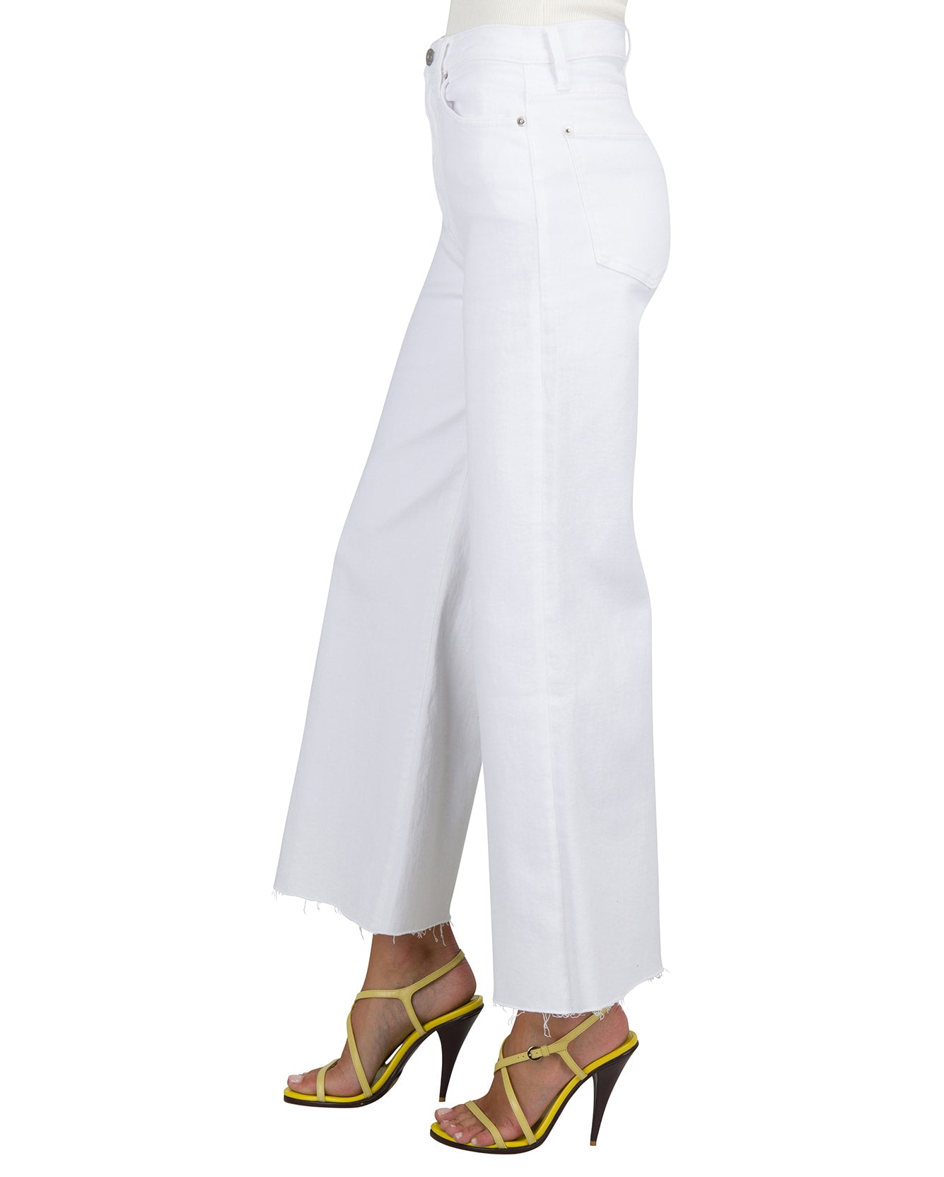White pants worn by a person on a white background