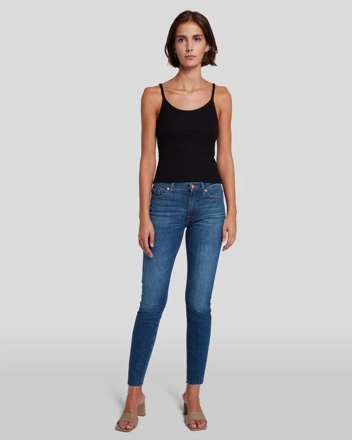 Front of the high waisted skinnys by 7 For All Mankind, with a tucked in black tank top.