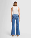 Full back view of the 7 For All Mankind Dojo Tailorless jeans, emphasizing the relaxed leg, sculpting fit, and the signature 7 back pocket.