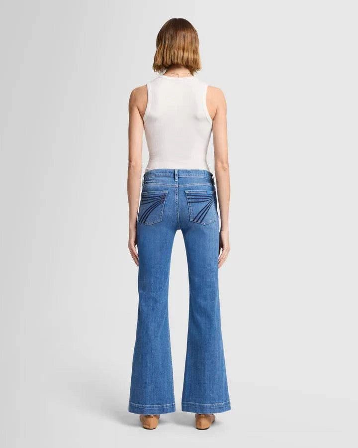 Full back view of the 7 For All Mankind Dojo Tailorless jeans, emphasizing the relaxed leg, sculpting fit, and the signature 7 back pocket.