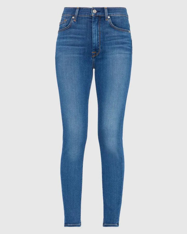 Full front view of the 7 For All Mankind High Rise Ankle Skinny jeans, highlighting the flattering high-rise silhouette and sculpting effect in the classic blue wash.