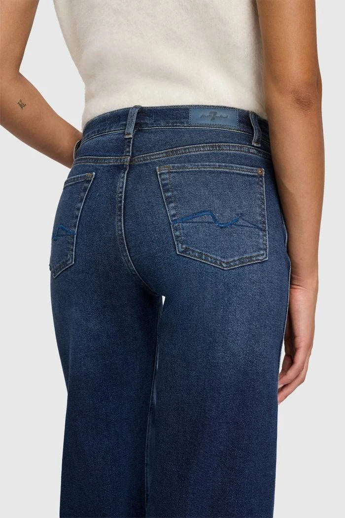 Back view of 7 For All Mankind Lotta High-Waist Flare Jeans in Dark Blue.