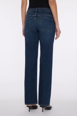 7 For All Mankind Calie Straight jeans in dark blue wash, back view, styled with black heels – available at Lemonberry in Aurora and online in Quebec

