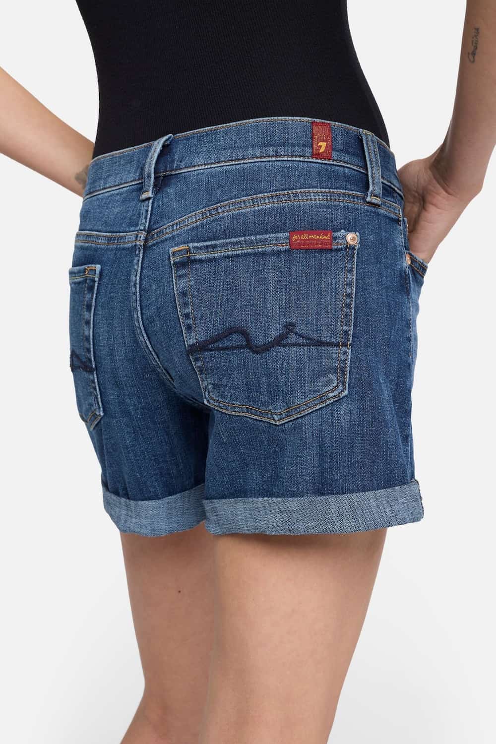 7 For All Mankind Mid Roll Denim Shorts vanity wash angled-back view Lemonberry Aurora