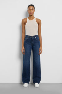 Front view of 7 For All Mankind Tess Trouser in indigo wide-leg denim, styled at Lemonberry Boutique.