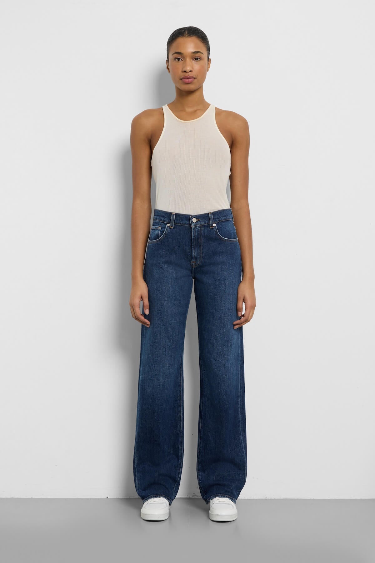 Front view of 7 For All Mankind Tess Trouser in indigo wide-leg denim, styled at Lemonberry Boutique.