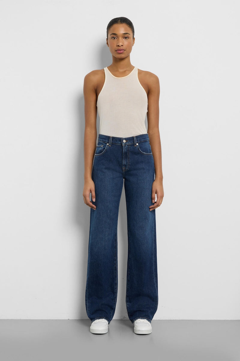 Front view of 7 For All Mankind Tess Trouser in indigo wide-leg denim, styled at Lemonberry Boutique.
