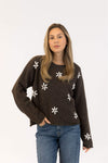 Front view of Aiden Daisy dark brown floral sweater styled casually with denim – shop Lemonberry Aurora