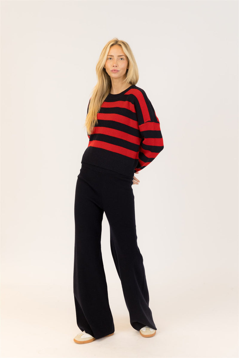 Front view of Bobby Crewneck styled with black pants, casual pose