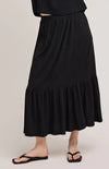 Front view of the  Elaine Skirt by Gentle Fawn, paired with black flip flops. Available at Lemonberry, a few minutes south of Bradford.
