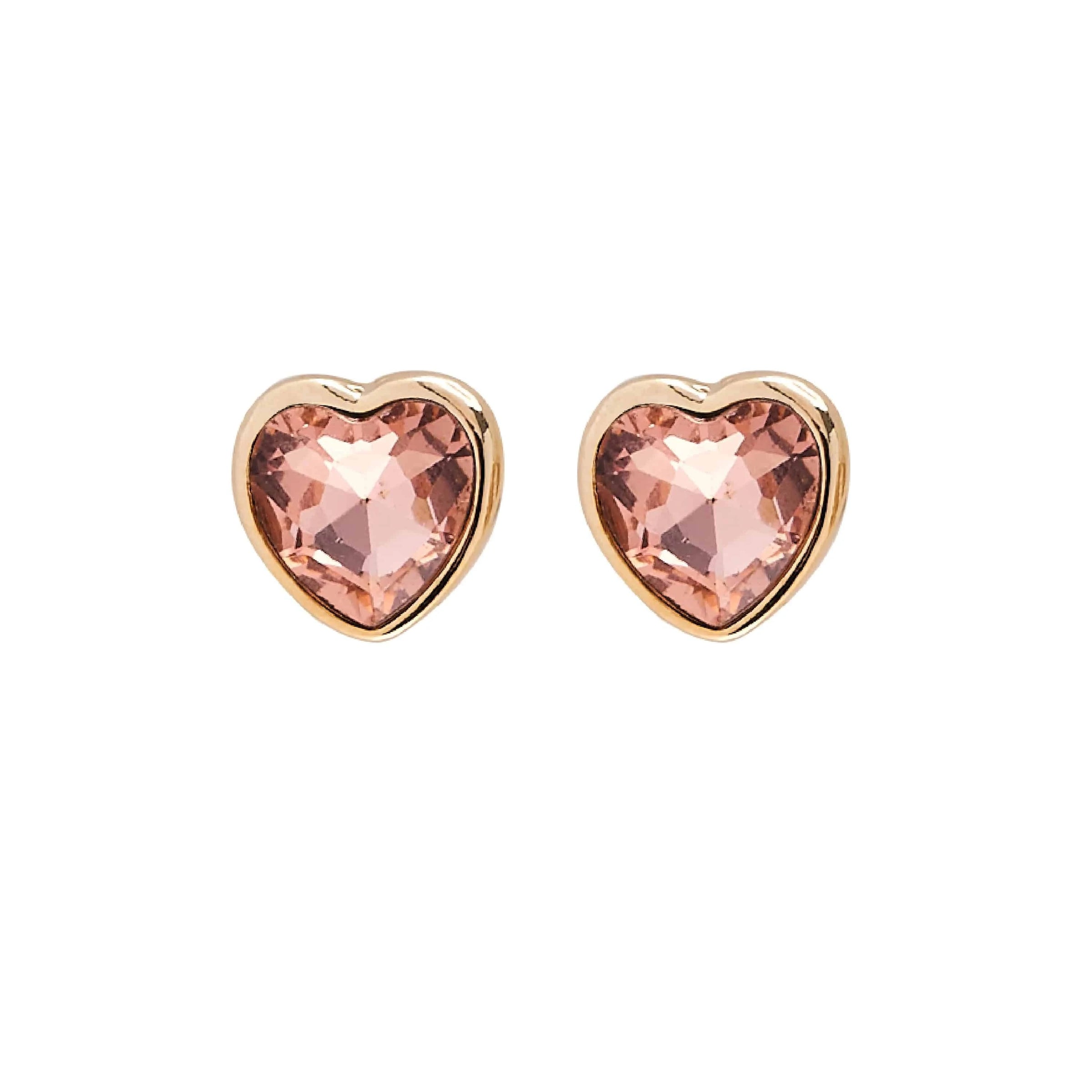 A pair of Foxy Originals Freya Earrings featuring heart-shaped rose-colored stones set in a 14K gold-plated fine pewter border. Handmade in Canada.