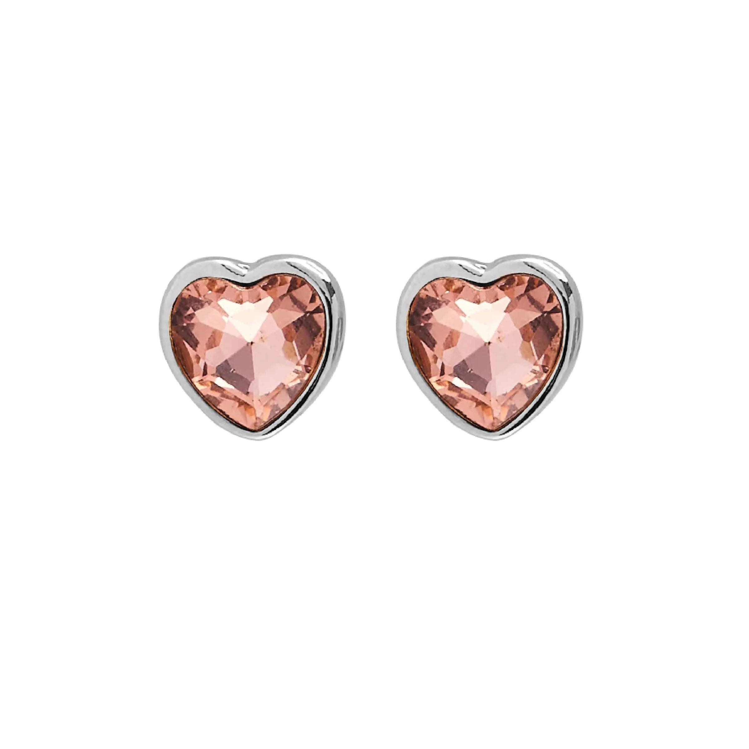 A pair of Foxy Originals Freya Earrings featuring heart-shaped rose-colored stones set in a silver-plated fine pewter border. Handmade in Canada.
