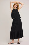 Model wearing the midi Elaine Skirt, paired with a black tank and black flip flops.