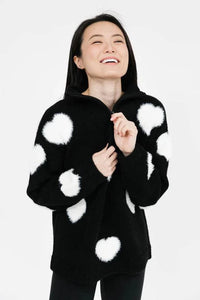 Another view of the Galentine's Day Sweater in black and white, highlighting its cozy fit, festive design, and relaxed comfort, perfect for celebrating with friends.