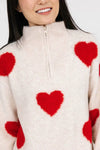 Another view of the Galentine's Day Sweater in red and white, showcasing its cozy fit and festive design, perfect for a fun, comfortable celebration with friends.