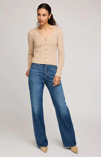 Full front view of the Mia V-Neck Pullover by Gentle Fawn styled with jeans and boots, highlighting the button front and relaxed fit.