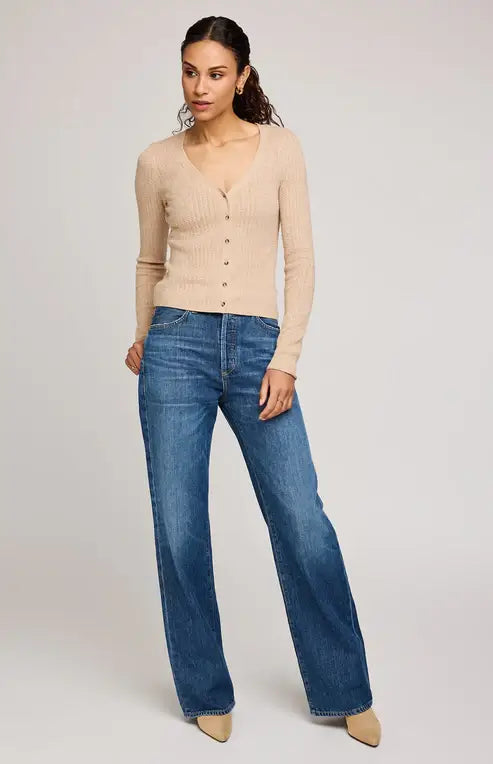 Full front view of the Mia V-Neck Pullover by Gentle Fawn styled with jeans and boots, highlighting the button front and relaxed fit.