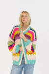 Front-facing view of Haven Cardigan’s bold colour-block pattern and drapey silhouette