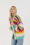 Side angle showing relaxed fit and sleeve detail of the Haven Cardigan by Lyla & Luxe