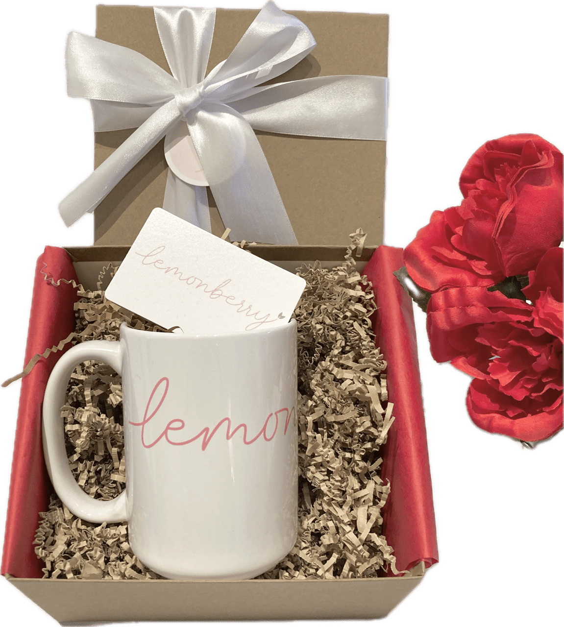 A Lemonberry gift box containing a unique Lemonberry mug and a customizable gift card, beautifully packaged with tissue, bow, sizzle, and Lemonberry tag.