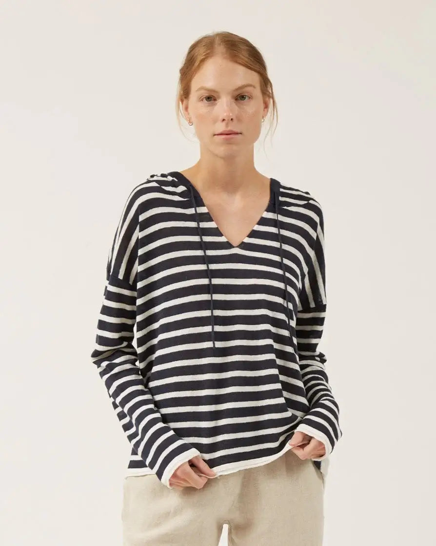Louise hoodie by Naif, paired with the Allen pants for a chic look.