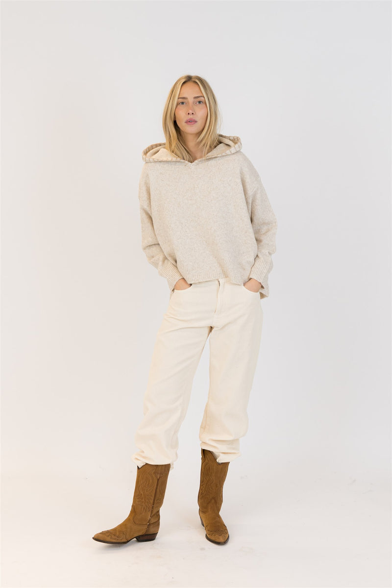 Lyla & Luxe Penny hoodie sweater in beige with camel heart, styled with ivory cords and cowboy boots