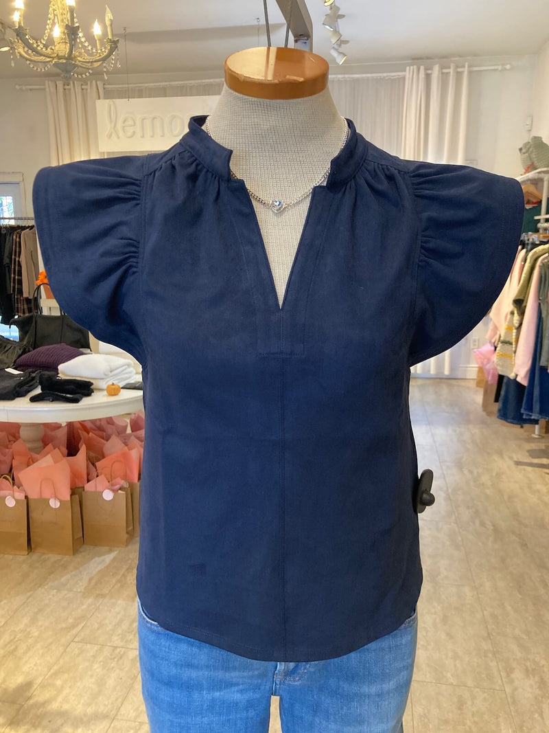 Venora Blouse by Melissa Nepton in Navy on a mannequin inside Lemonberry in Aurora, ON
