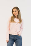 Front view of Lyla & Luxe Aisha Crystal Sweater in pink with crystal embellishments

