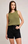 Close-up of model wearing the Andra Tank in Matcha, a soft knit tank with a crew neckline and side slits, available at Lemonberry, Aurora, ON.