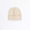 Beige knit beanie with a pink heart on a white background
