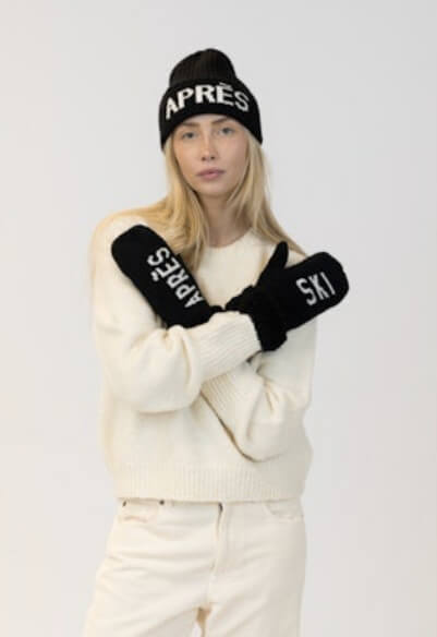 Apres Ski Set by Lyla & Luxe in black, includes matching beanie and gloves, photographed on textured neutral background