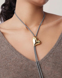 Gold heart bolo tie necklace, Jenny Bird, detail view — Lemonberry Aurora