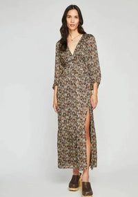 Model wearing the Beatrice Dress by Gentle Fawn in blue floral chiffon – front view, subtle shimmer detail