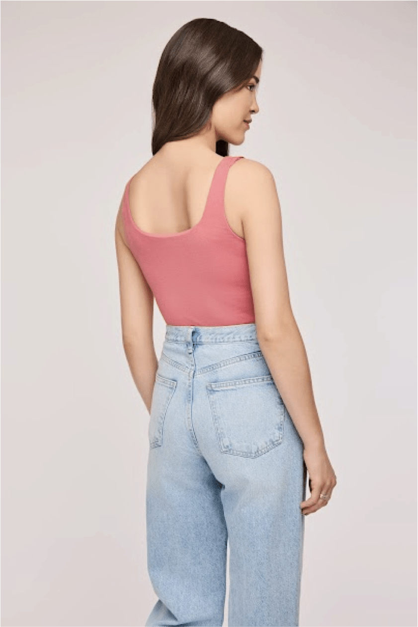 Back view of the Belize Top in berry with lightweight fabric and subtle detail