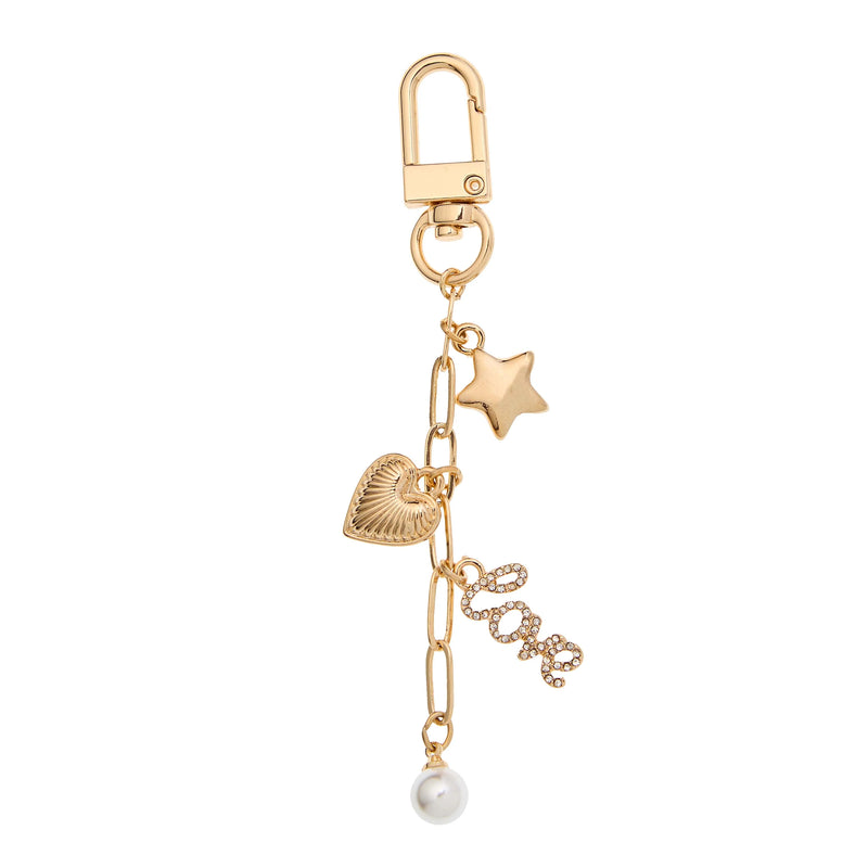 Bella Bag Charm by Foxy Originals in gold with star, heart, pavé “love” charm, and pearl drop