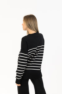 Back view of black and white striped Billie sweater by Lyla & Luxe