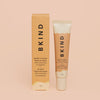 BKIND peach and melon lip balm tube and box on peach background — Lemonberry Aurora