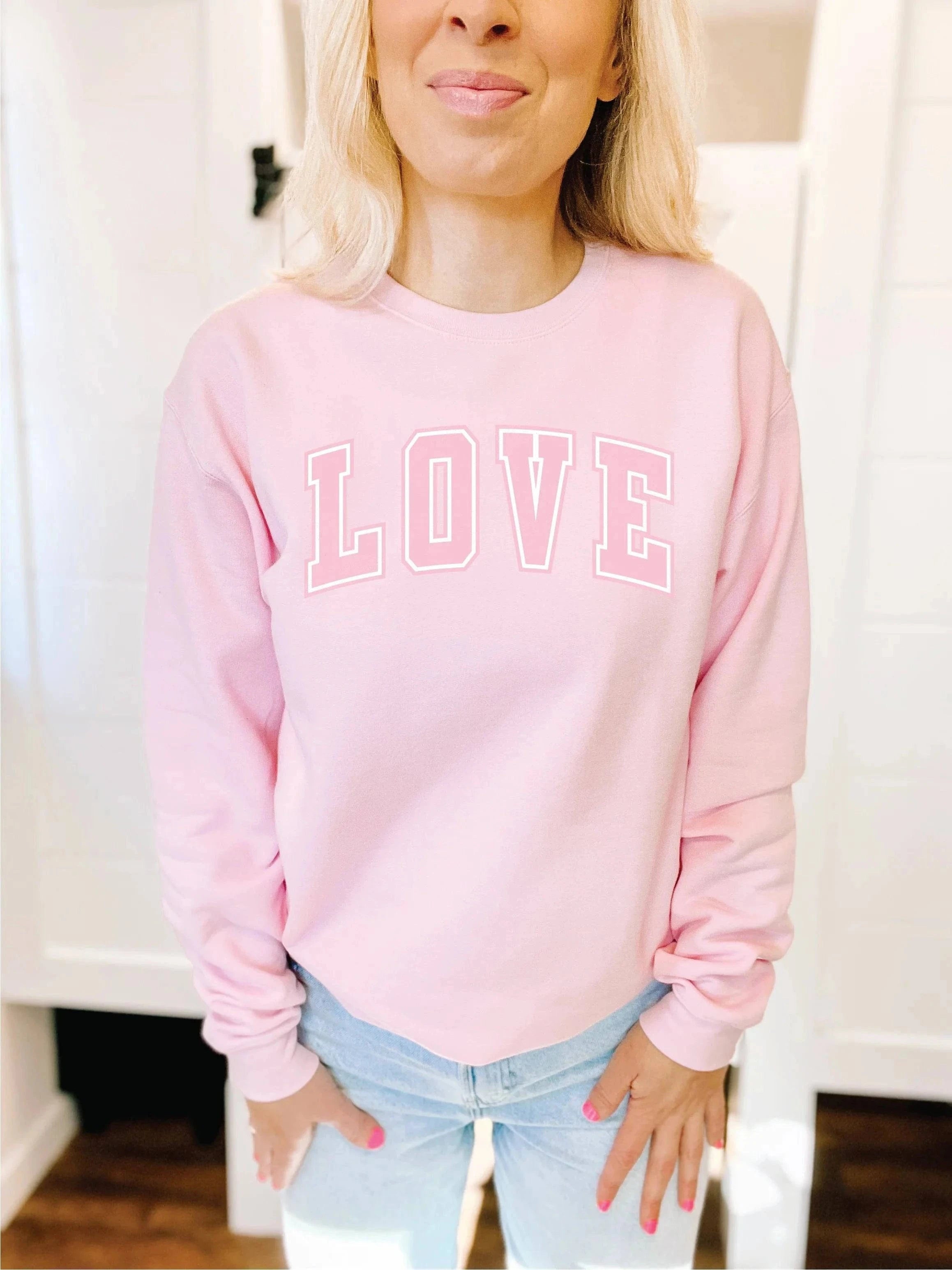 Blonde Ambition Tops Love Varsity Sweatshirt available at Lemonberry Boutique Aurora