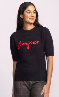 Front view of black Pink Martini Bonjour Sweater featuring red “Bonjour” embroidery – Canadian boutique style at Lemonberry.