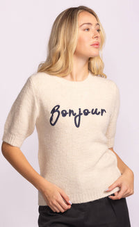 Casual look with beige Pink Martini Bonjour Sweater and navy embroidery – versatile women’s knit sweater at Lemonberry.