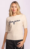 Front view of beige Pink Martini Bonjour Sweater featuring navy “Bonjour” embroidery – shop Canadian boutique Lemonberry.