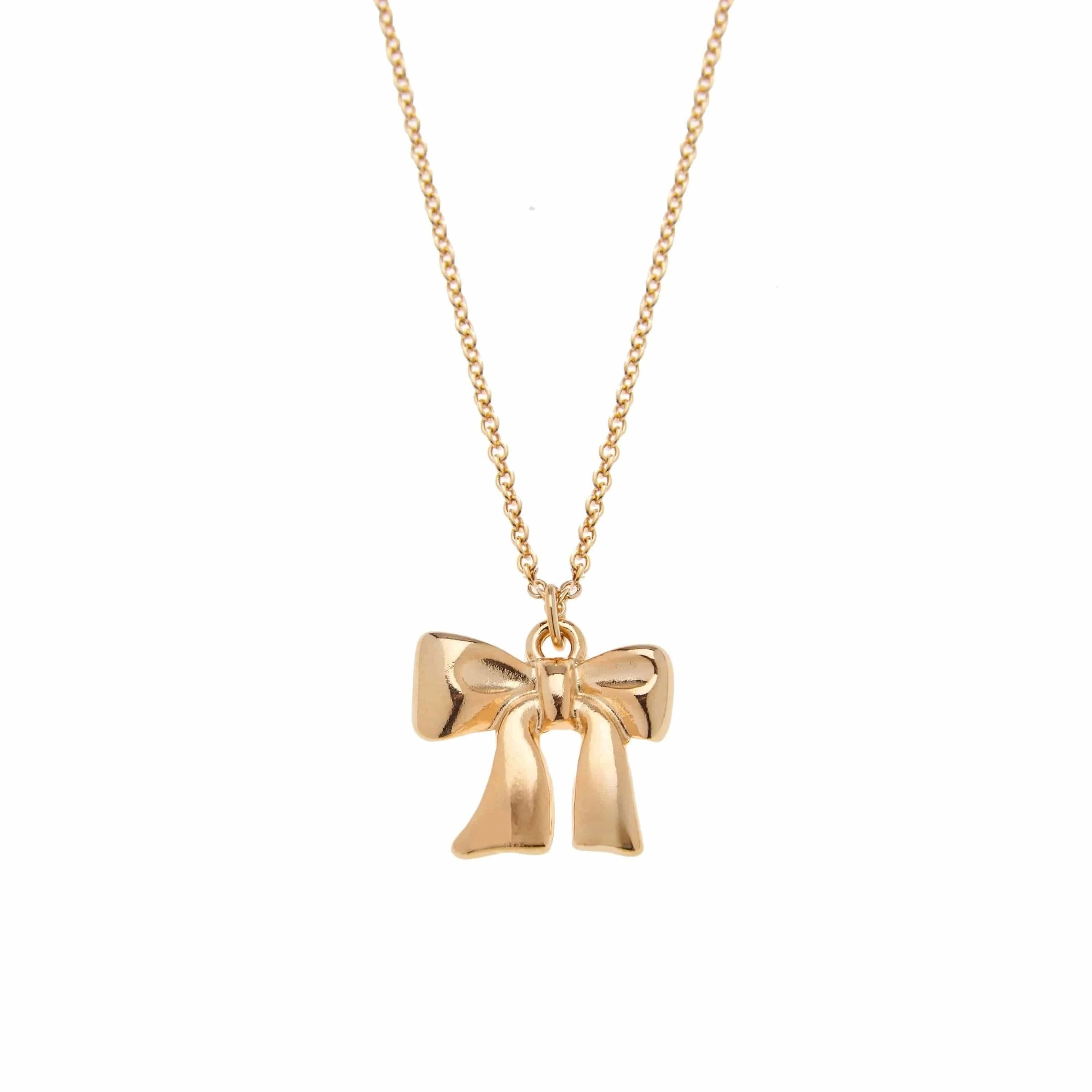 gold bow pendant on chain against white background, lemonberry aurora