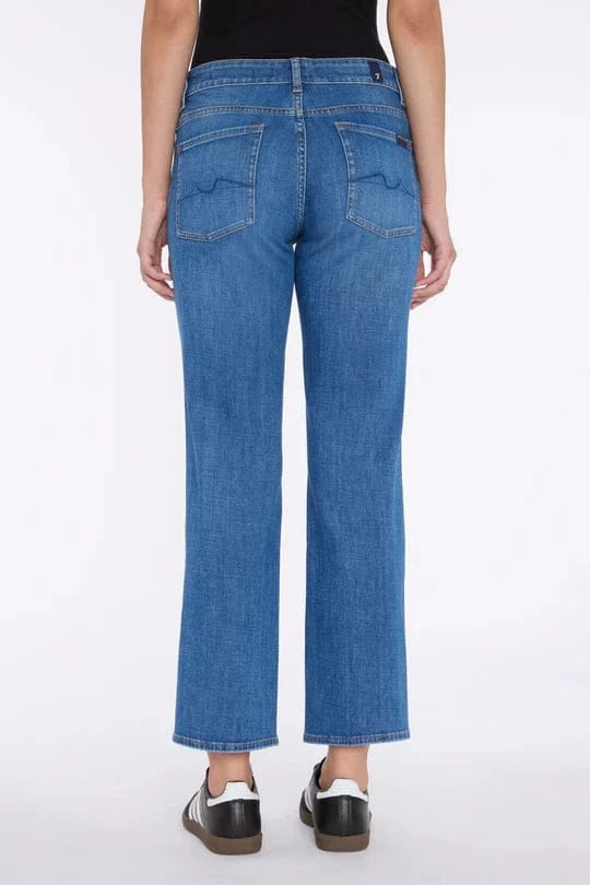 Back of the Calie Straight Legs by 7 For All Mankind, displaying the medium wash and signature pocket swirl.