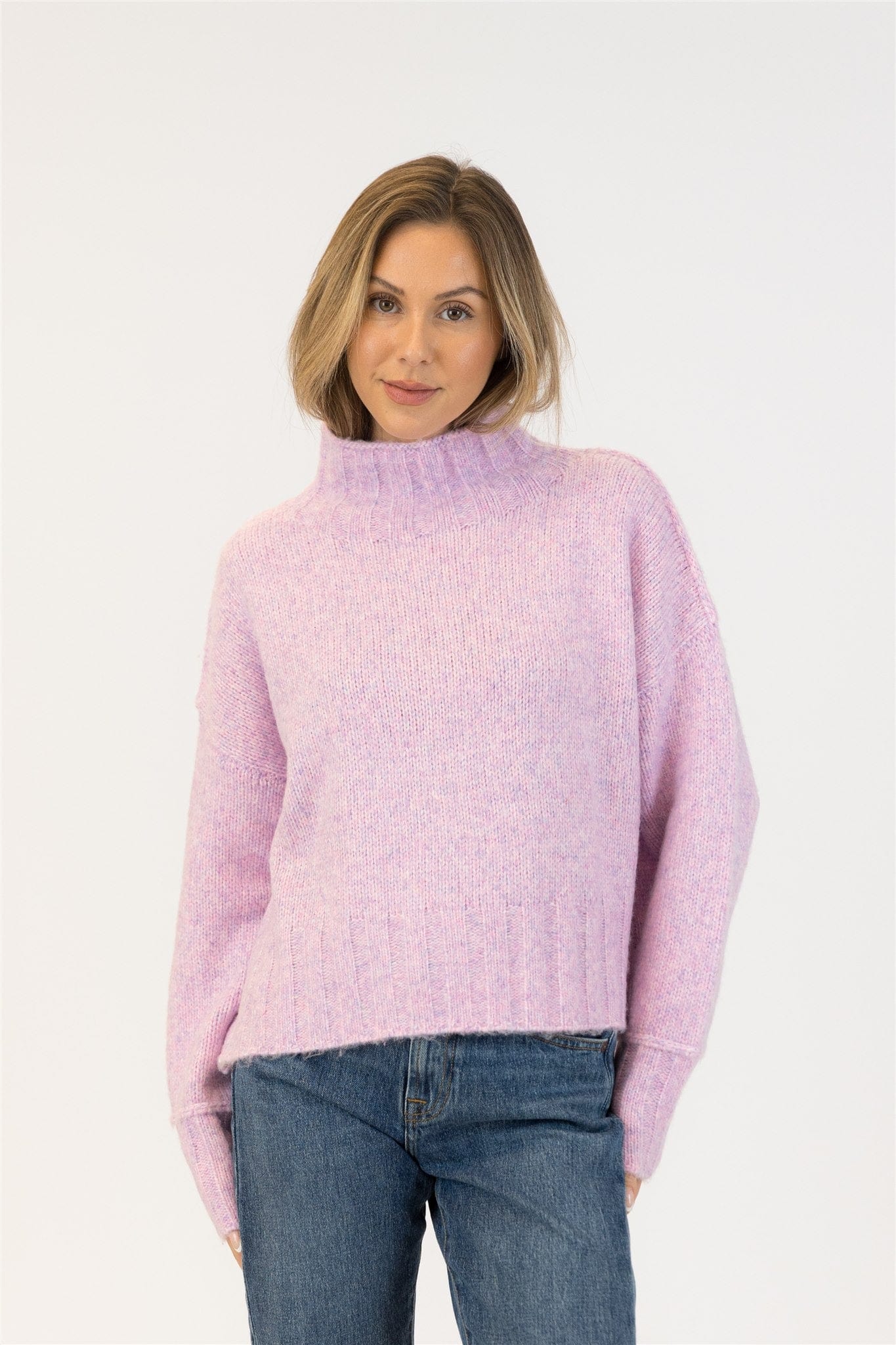 Lyla & Luxe Callie sweater in colourblock pink and purple, photographed for Lemonberry in Aurora, ON