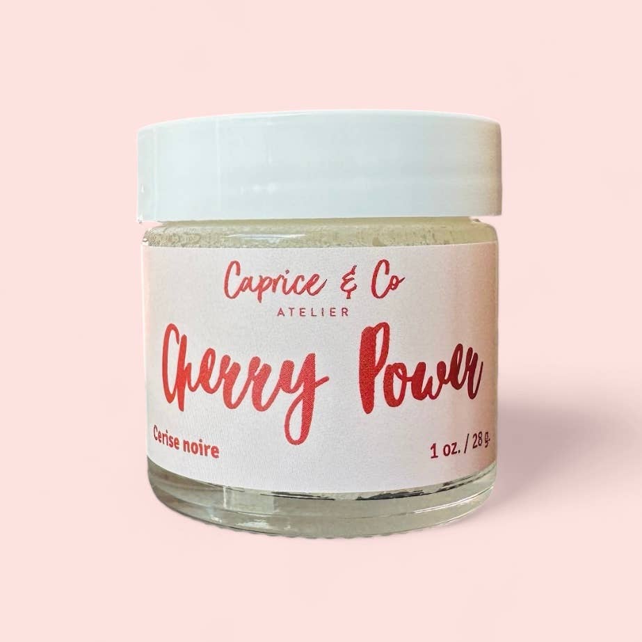 Caprice & Co Cherry Power lip scrub in glass jar with white lid, front view on pink background, Lemonberry Aurora